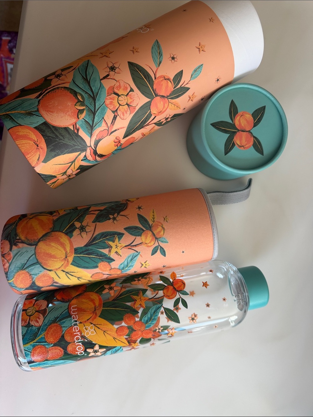 Waterdrop Orange Blossom Glass Bottle with Teal Cap